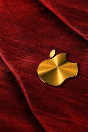 赤い布にゴールドのアップルロゴ