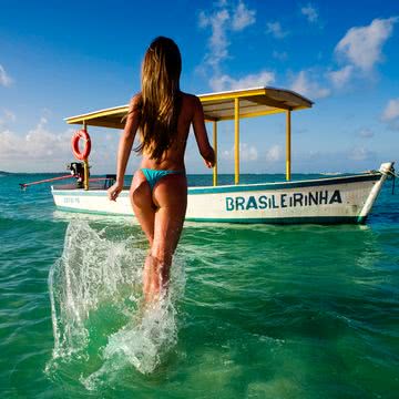 Blonde Girl On The Beach