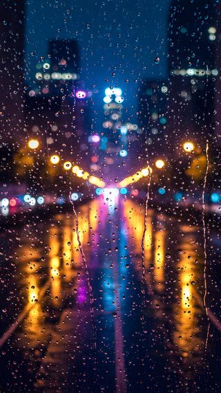 【新着3位】ガラス越しの雨の夜景|夜のiPhone壁紙