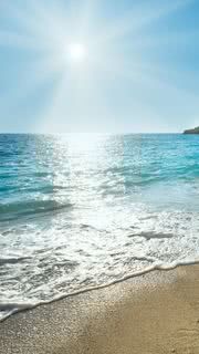 砂浜と眩しい太陽 |  夏っぽいiPhone壁紙