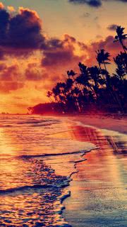 ロマンチックな夕焼けのビーチ Iphone12 スマホ壁紙 待受画像ギャラリー