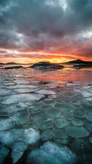 流氷と夕焼け | 美しい風景のiPhone壁紙