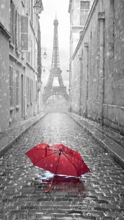 赤い傘とモノクロの風景